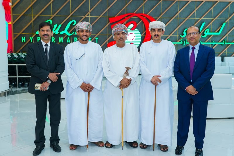 Sheikh Mohammed Al Ghazali with guests at a Lulu opening